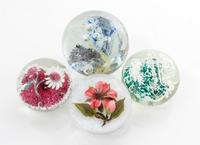 A Group of Four Paperweights
