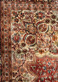 An Indo-Kashan Silk and Wool Rug