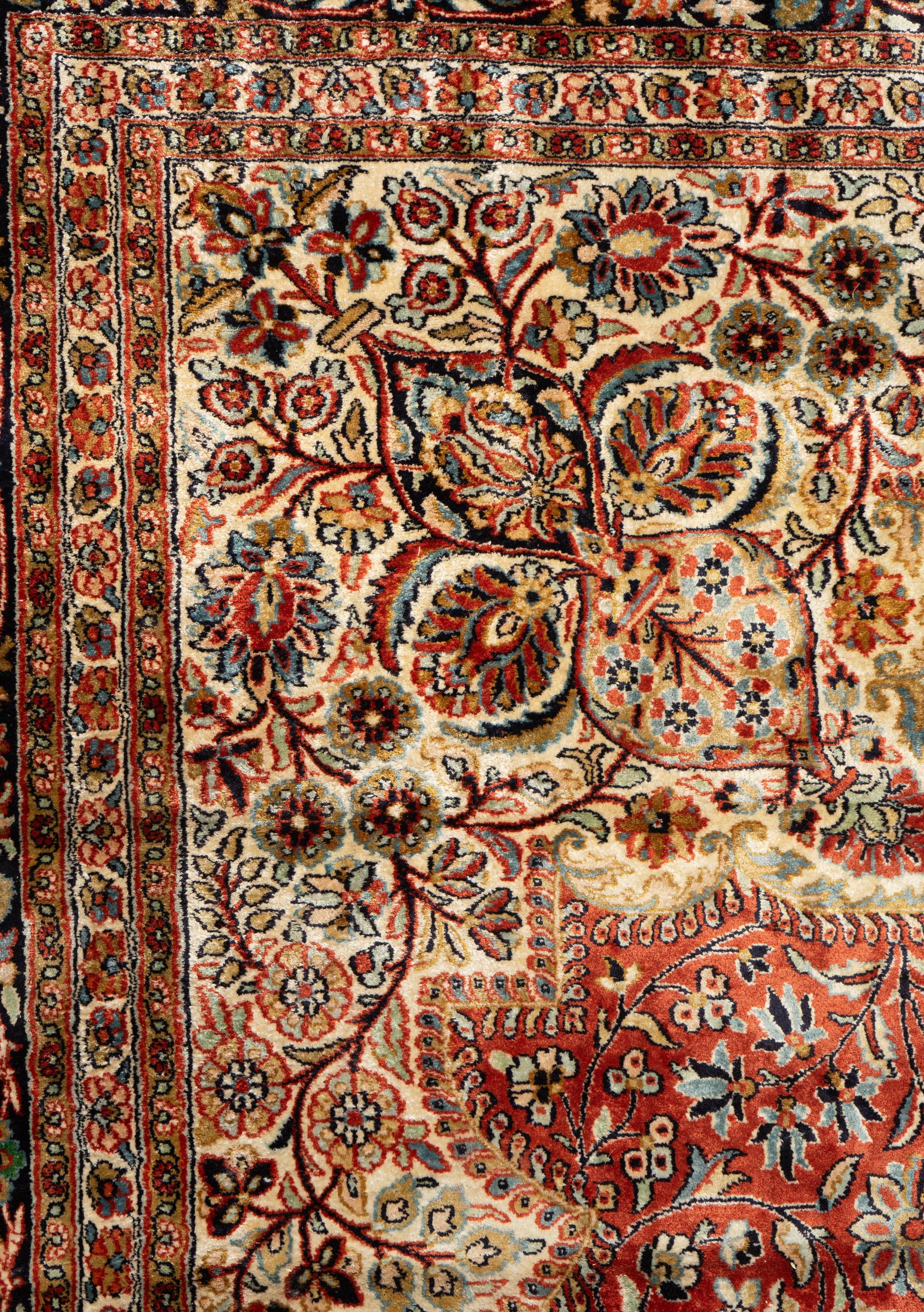 An Indo-Kashan Silk and Wool Rug