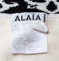 An Alaia White and Black Body Con Dress, Size M.
