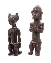 Two Carved Wood African Figures Height of tallest 22 inches.