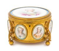 A Sevres Style Porcelain Mounted Gilt Metal Box Diameter 6 3/4 inches. — 19TH CENTURY