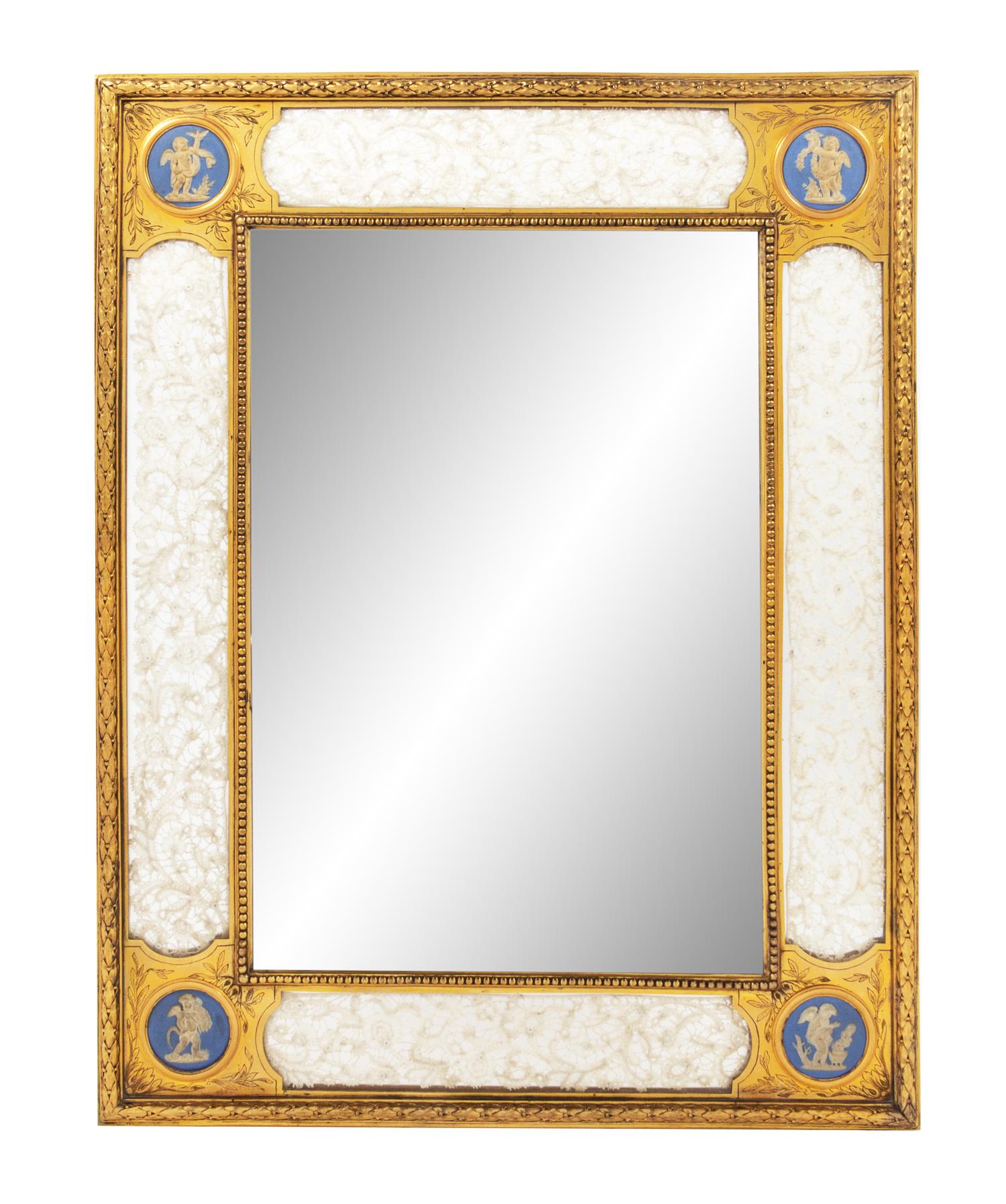 A Continental Gilt Bronze and Bisque Porcelain Picture Frame