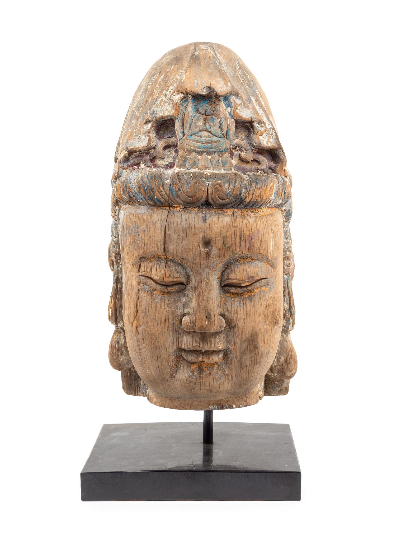 A Large Carved Wood Head of Guanyin Height 19 1/2 inches. — MING DYNASTY (1368-1644)