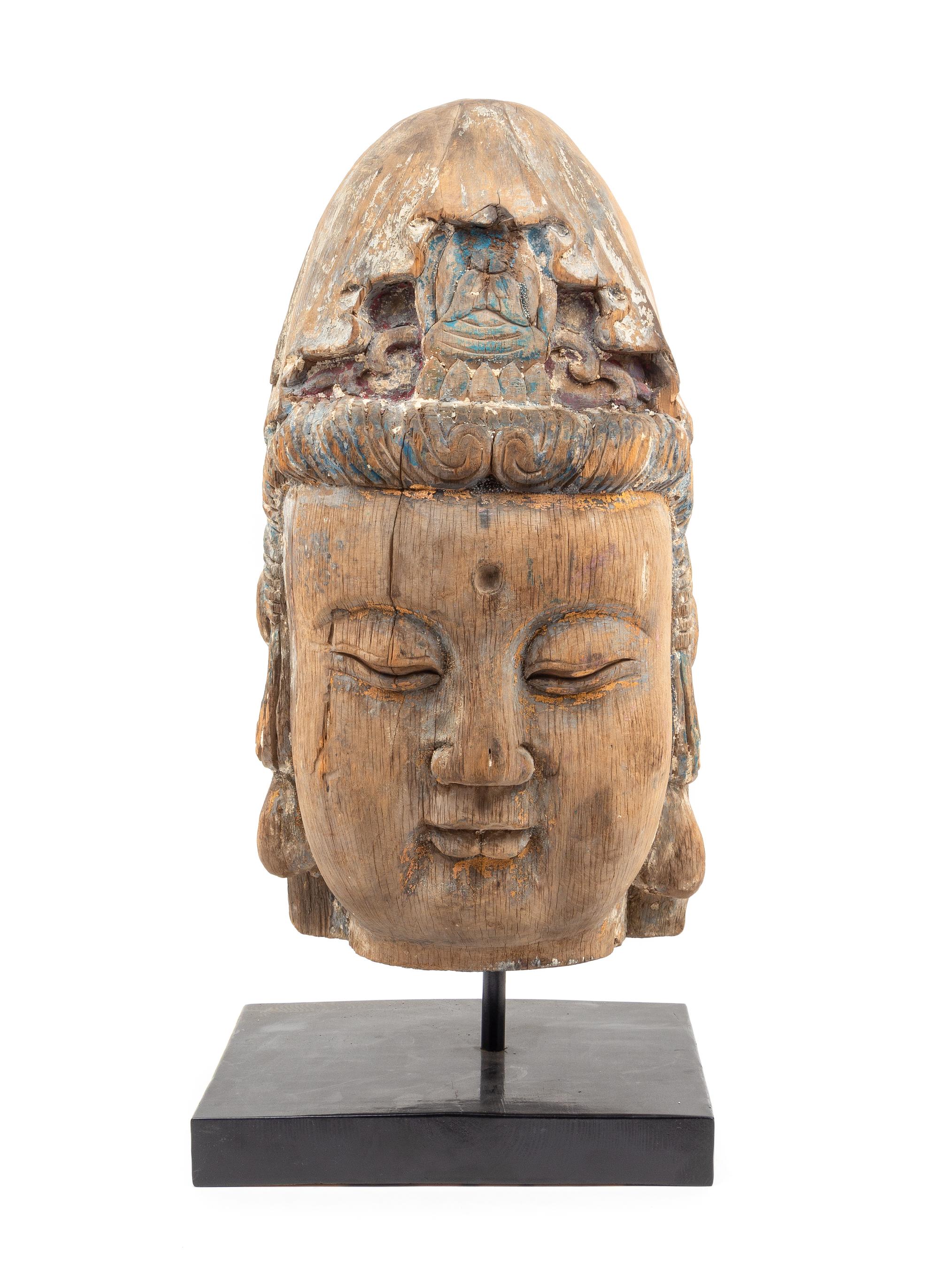 A Large Carved Wood Head of Guanyin Height 19 1/2 inches. — MING DYNASTY (1368-1644)
