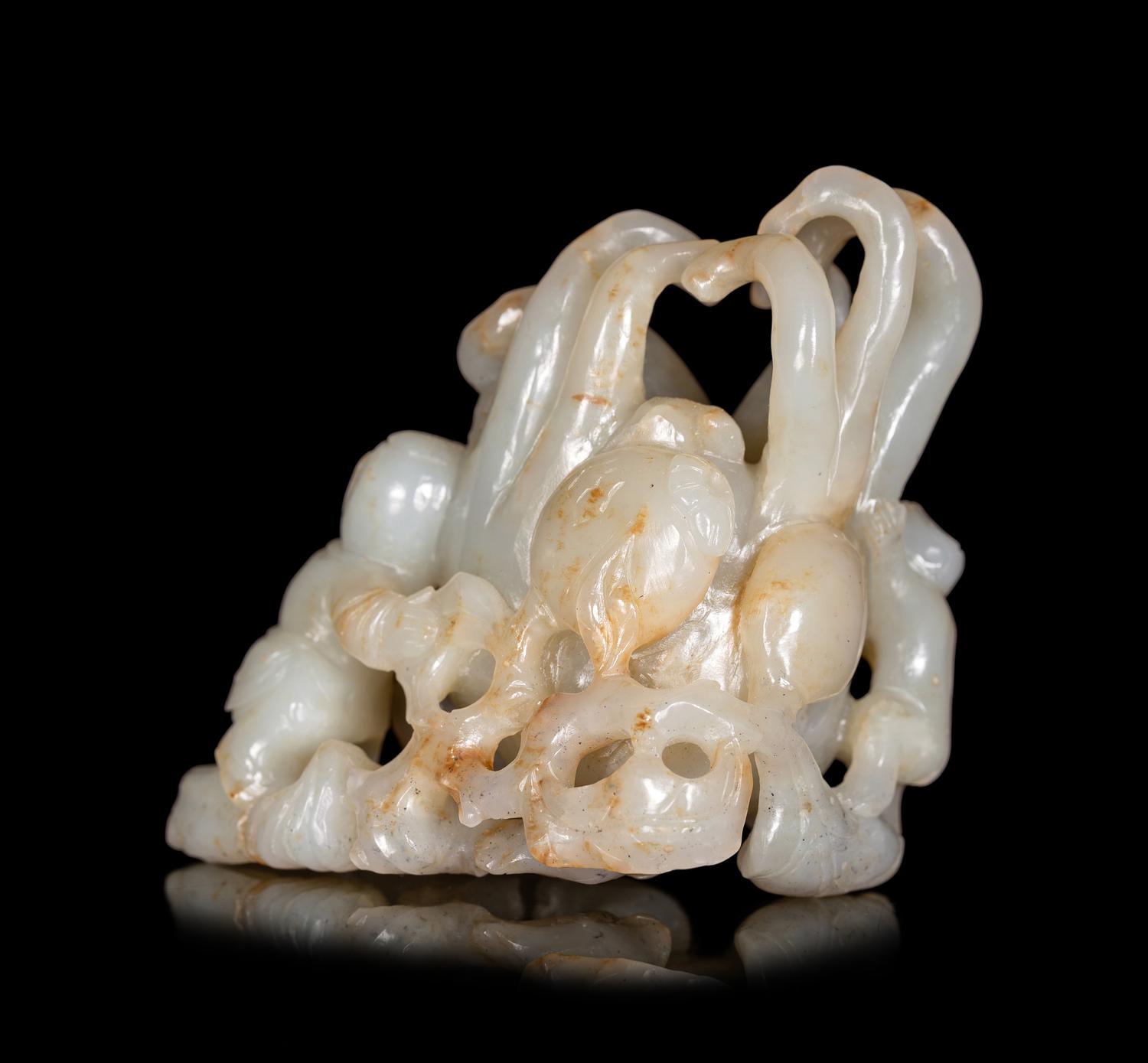 A Celadon Jade Figural Group