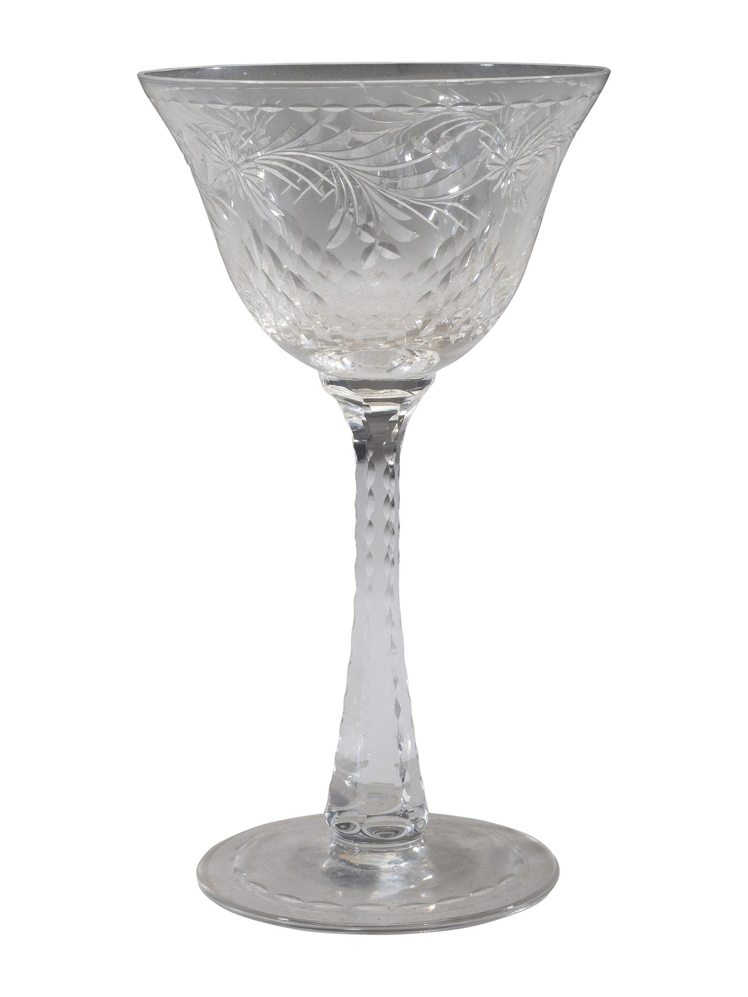A Collection of Cut Glass Stemware and Plates