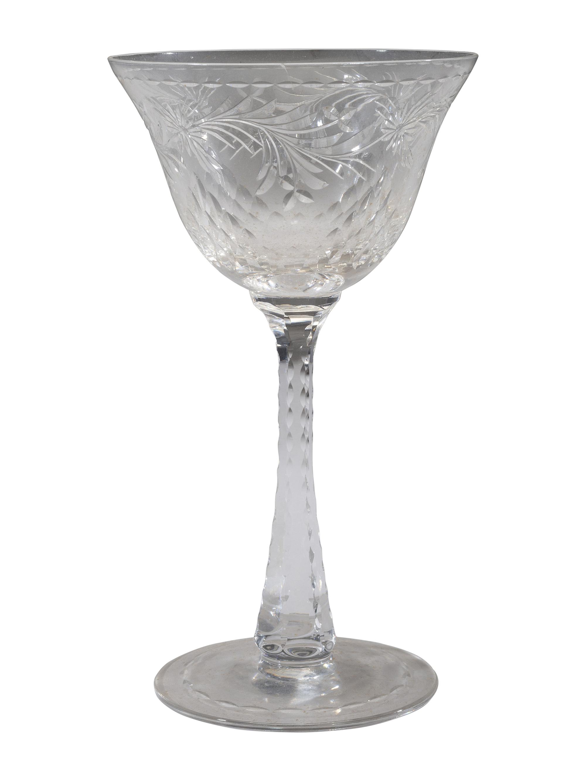 A Collection of Cut Glass Stemware and Plates