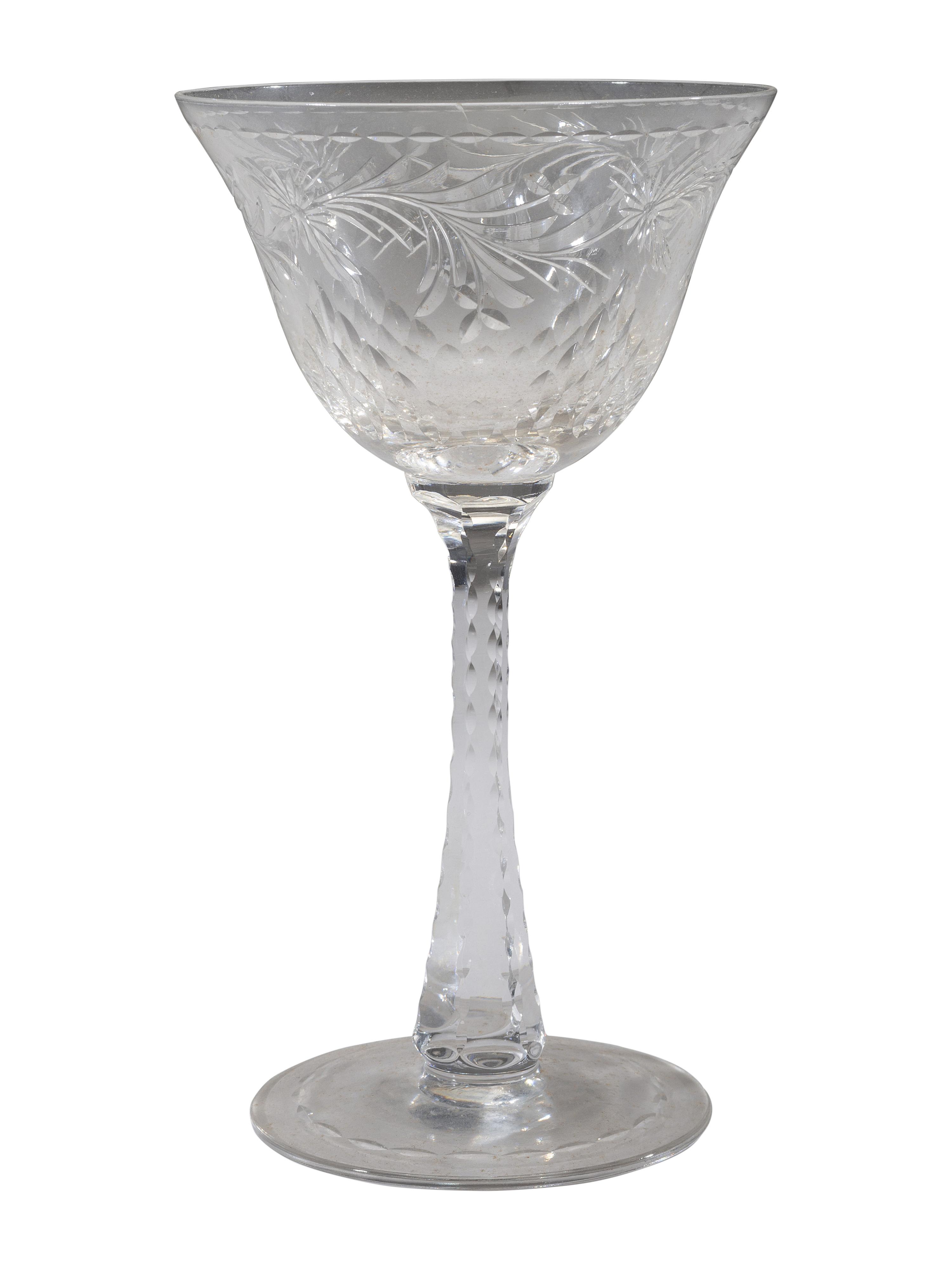 A Collection of Cut Glass Stemware and Plates