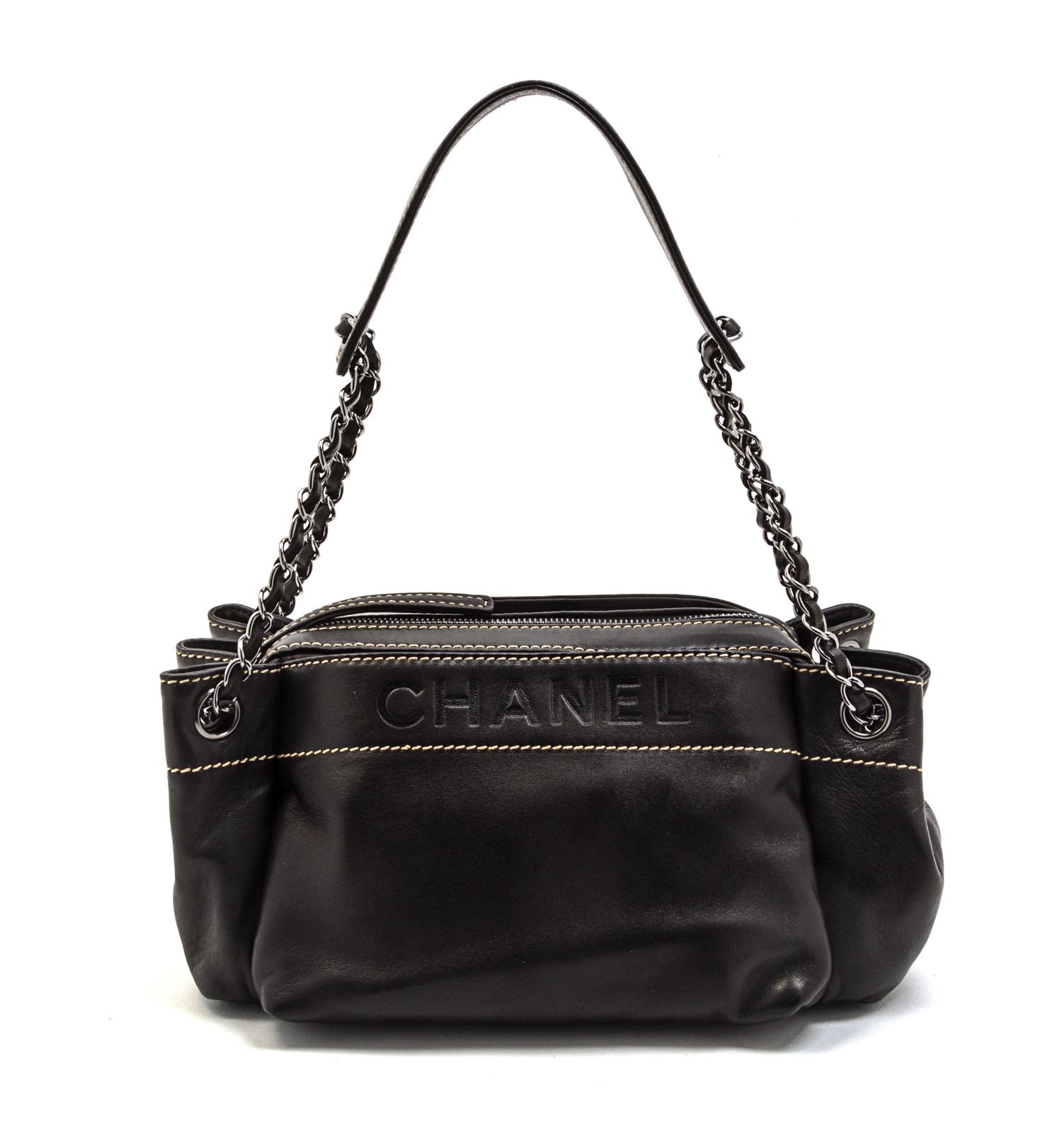 A Chanel Black Leather Bag, 11 x 5 1/2 x 5 inches.