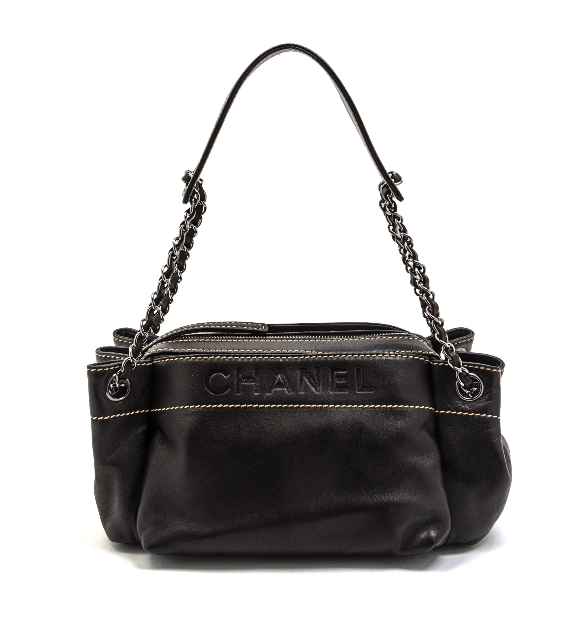 A Chanel Black Leather Bag, 11 x 5 1/2 x 5 inches.