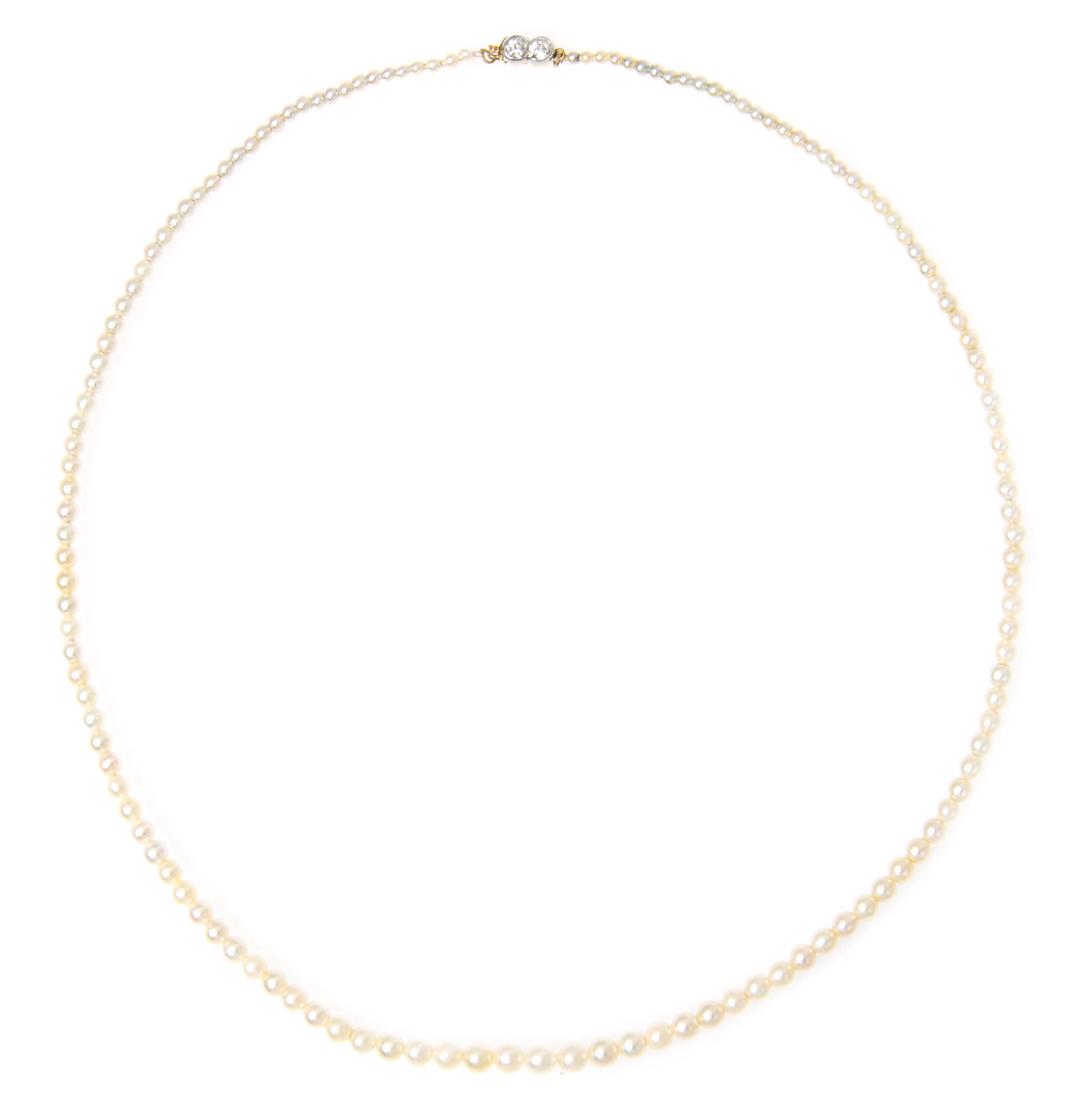 A Graduated Single Strand Natural Pearl Necklace,