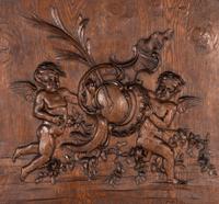 A French Carved Oak Trumeau Mirror