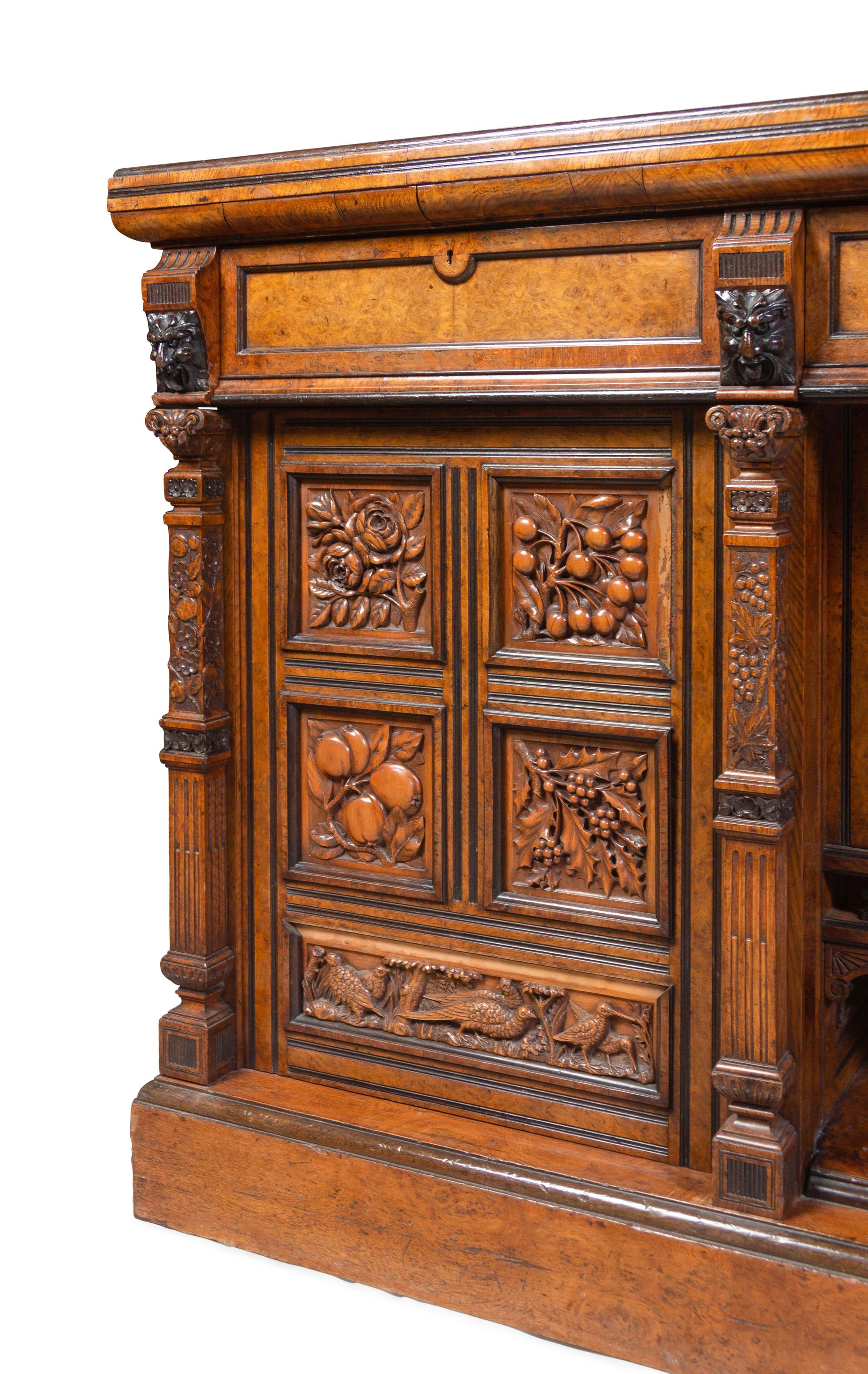 A Continental Carved Walnut and Burlwood Serving Cabinet