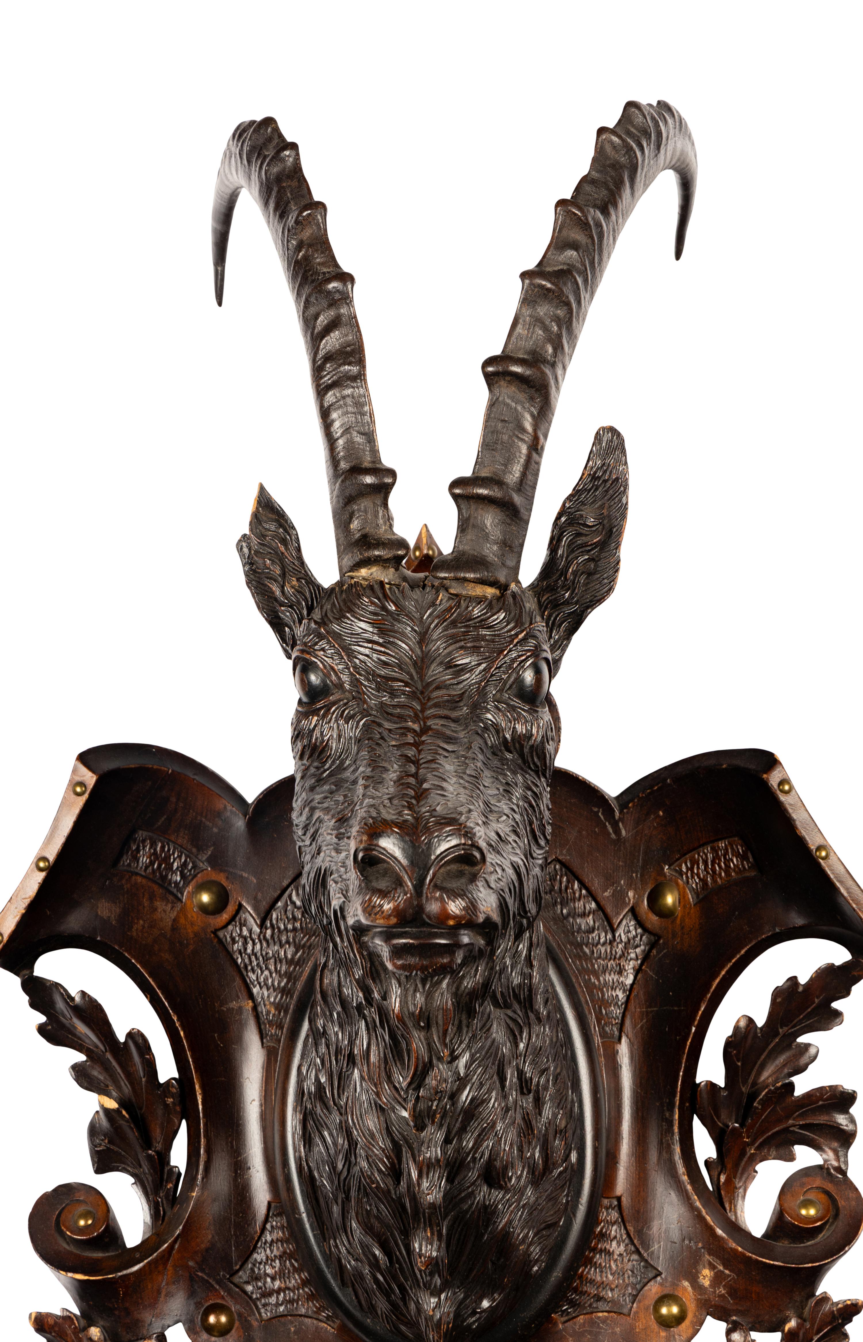 A Swiss "Black Forest" Carved Ibex Mount