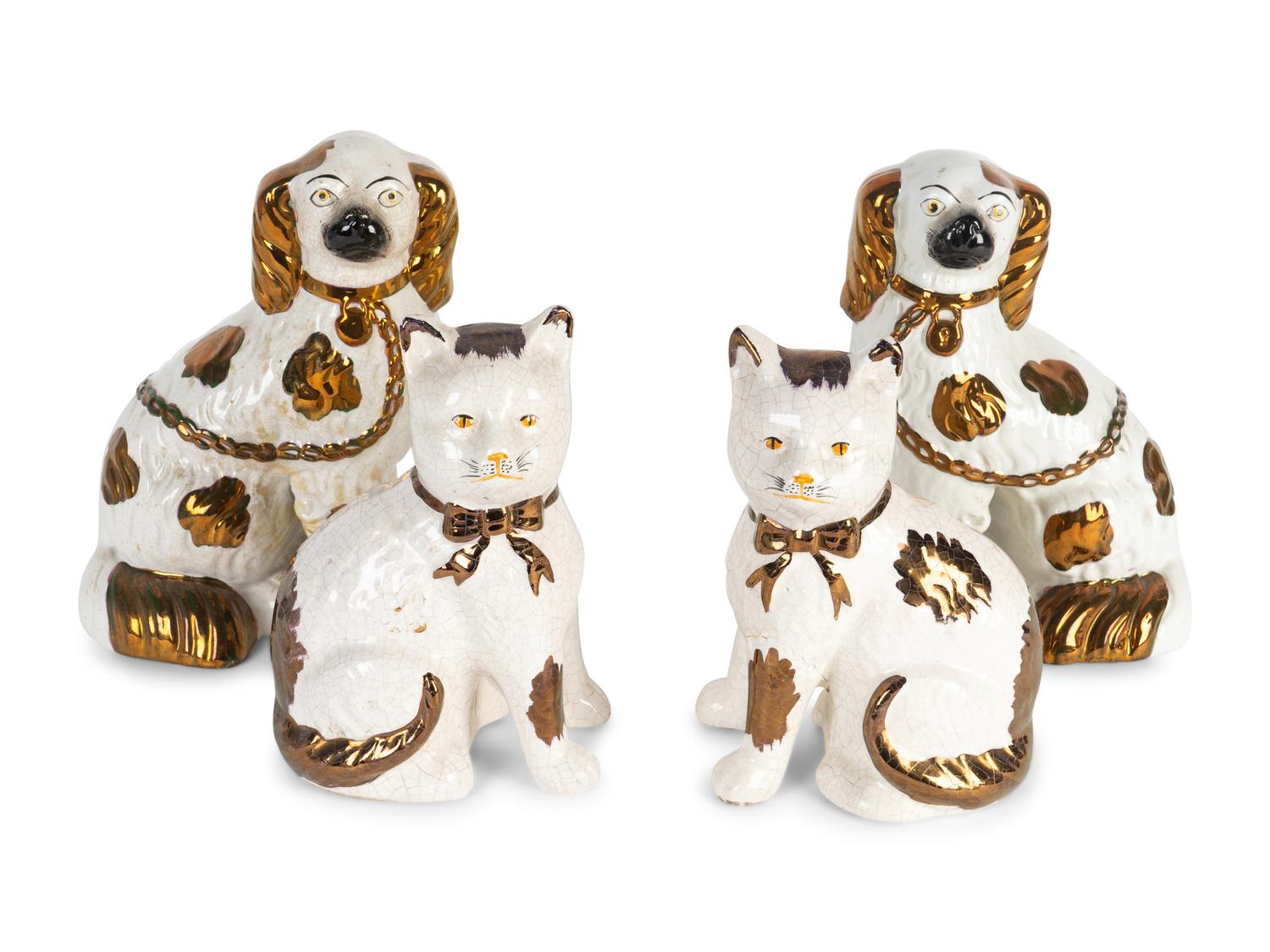 A Pair of Staffordshire Copper Lustre and Glazed Earthenware Spaniels and a Pair of Cats — EARLY 20TH CENTURY