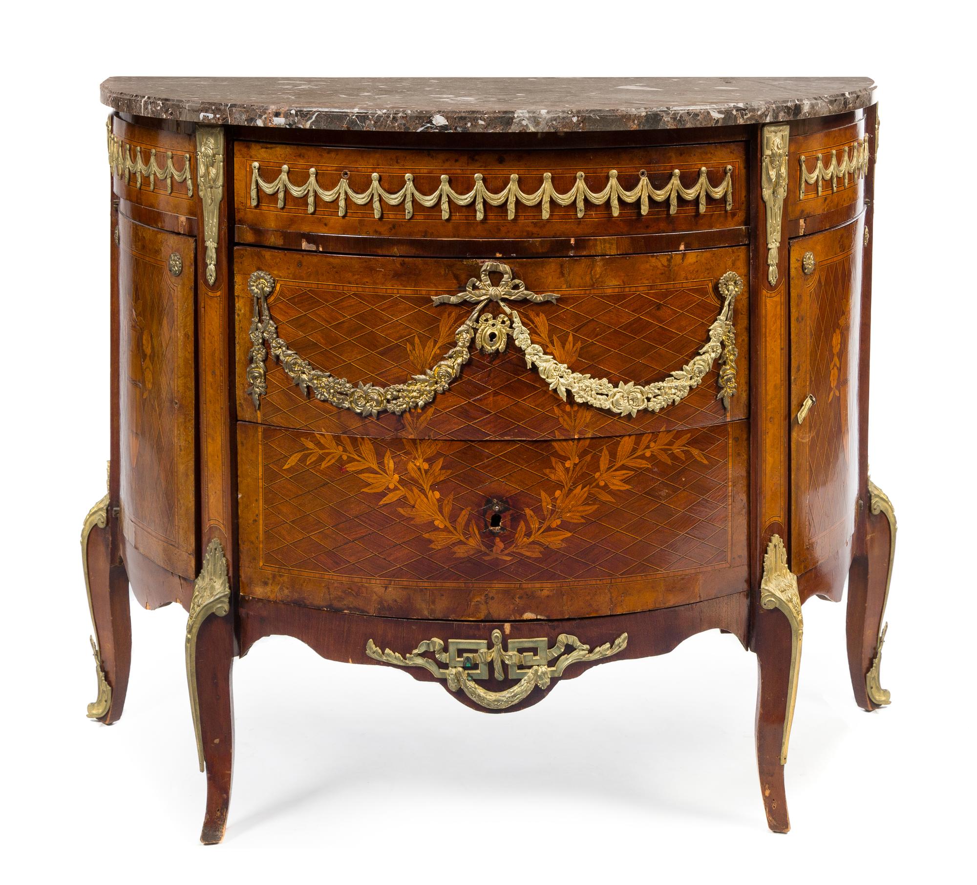 A Louis XV/XVI Transitional Style Gilt Bronze Mounted Parquetry and Marquetry Commode Height 36 x width 44 x depth 20 inches. — LATE 19TH CENTURY