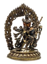 A Sino-Tibetan Gilt Bronze Figure of a Multi-Head Deity