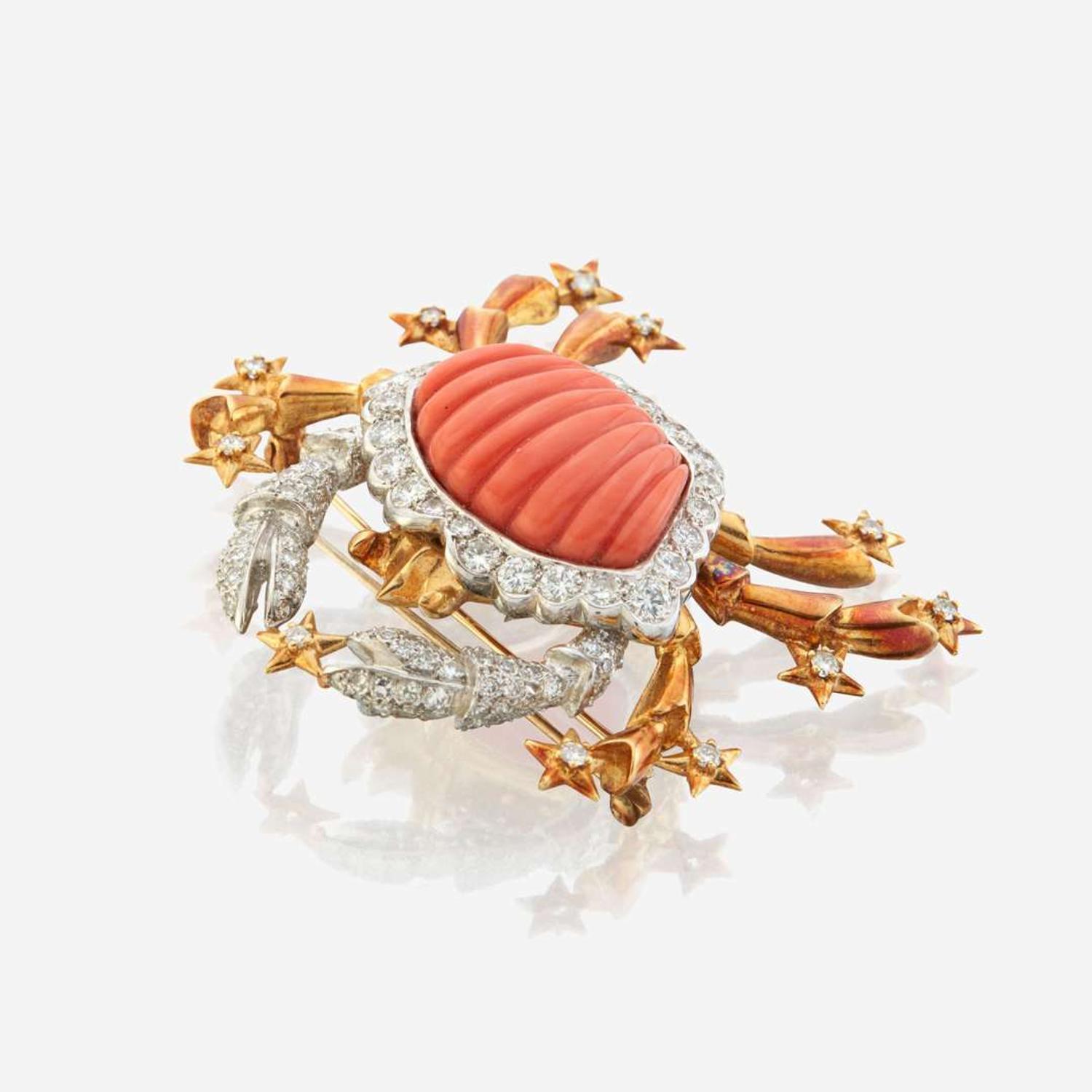 A coral, diamond, and bicolor gold pendant/brooch