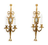 A Pair of Gilt Metal Two-Light Wall Appliques
