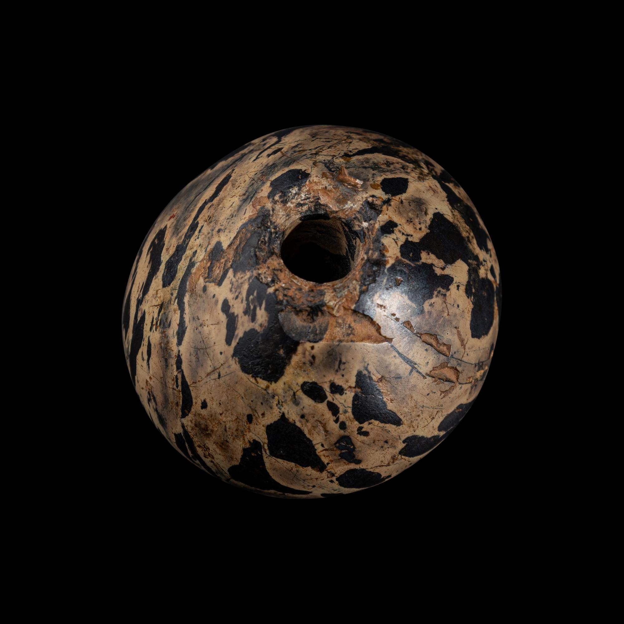 An Egyptian Breccia Mace Head