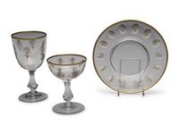 A Set of Tiffin Glass Company Gold and Glass Stemware and Plates