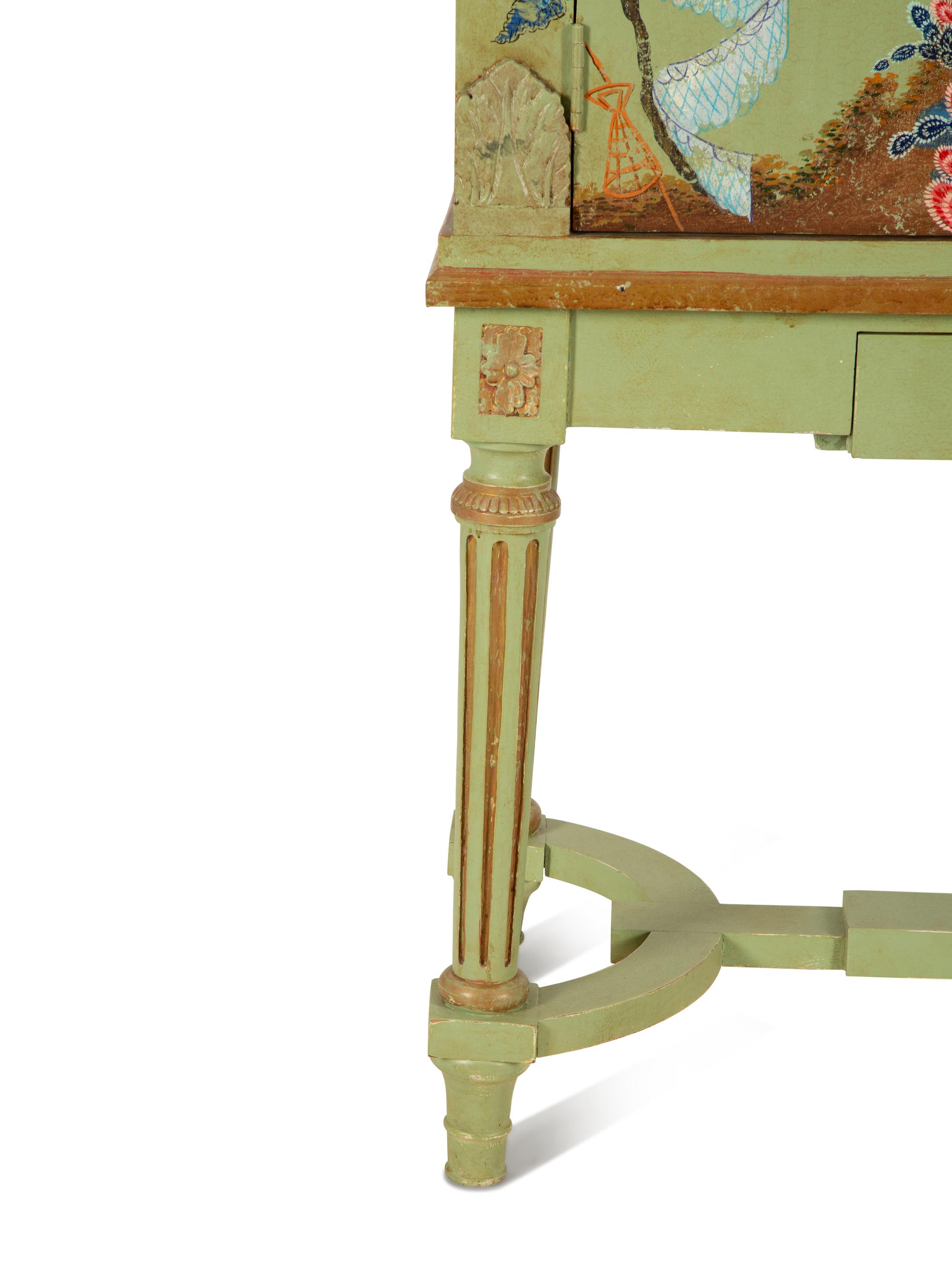 A Louis XVI Style Painted and Parcel Gilt Chinoiserie Decorated Cabinet on Stand