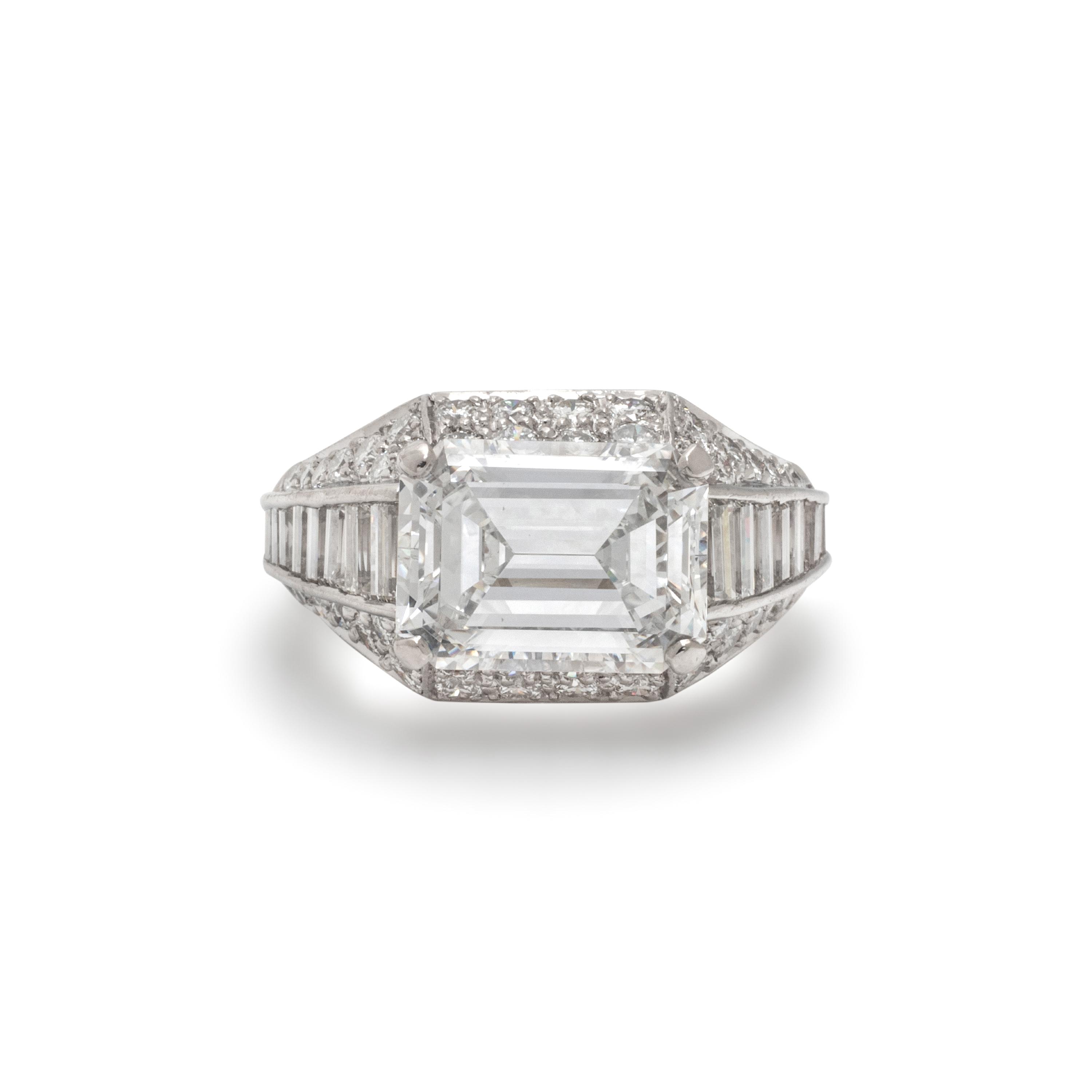 BULGARI, EMERALD CUT DIAMOND AND DIAMOND 'TROMBINO' RING