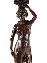 A Victorian Carved Oak Figural Pedestal