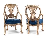A Pair of Silvered Carved Wood “Fantasy” Armchairs