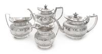 A George III Silver Four-Piece Tea Set, Daniel Pontifex, London, 1802-03, comprising a large teapot, smaller teapot, creamer and sugar