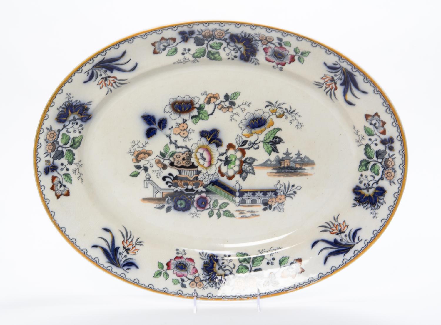 A Porcelain Platter Width 21 inches. — 20TH CENTURY