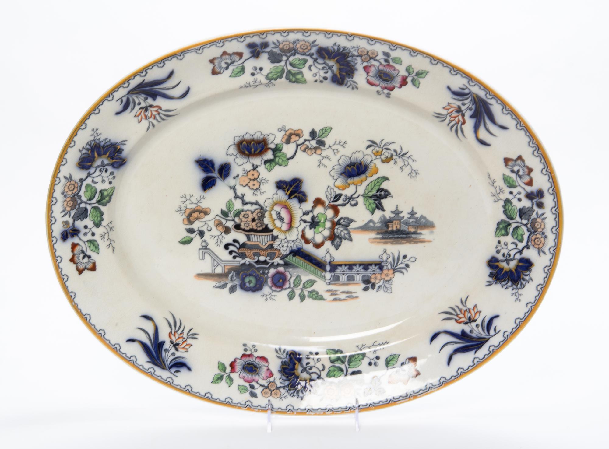 A Porcelain Platter Width 21 inches. — 20TH CENTURY
