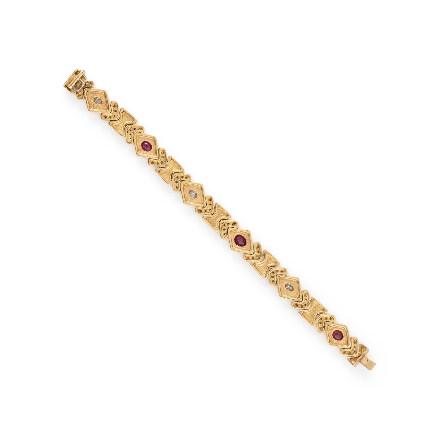 DIAMOND, RUBY, AND YELLOW GOLD BRACELET