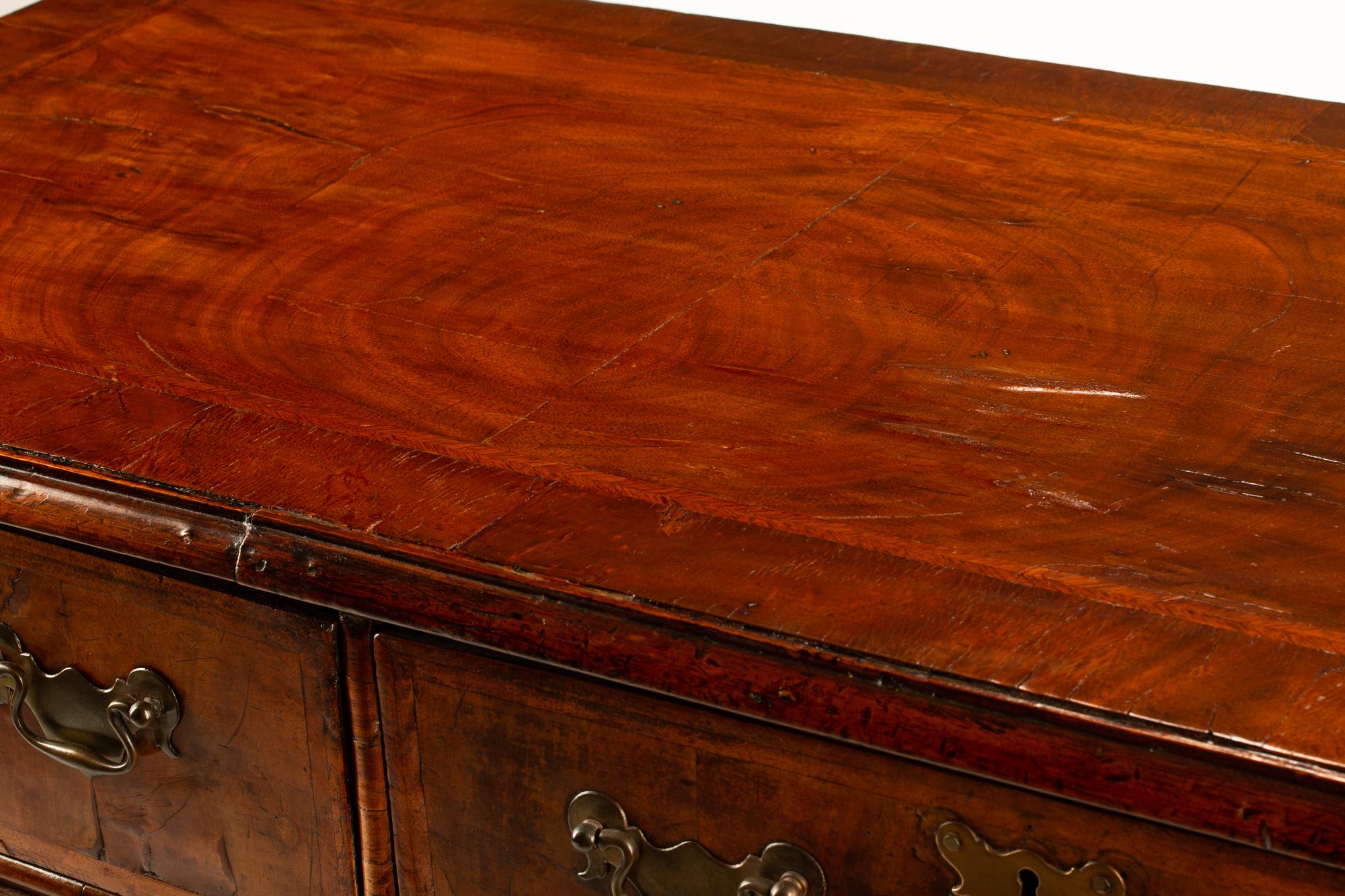 A George II Style Inlaid Walnut Chest of Drawers