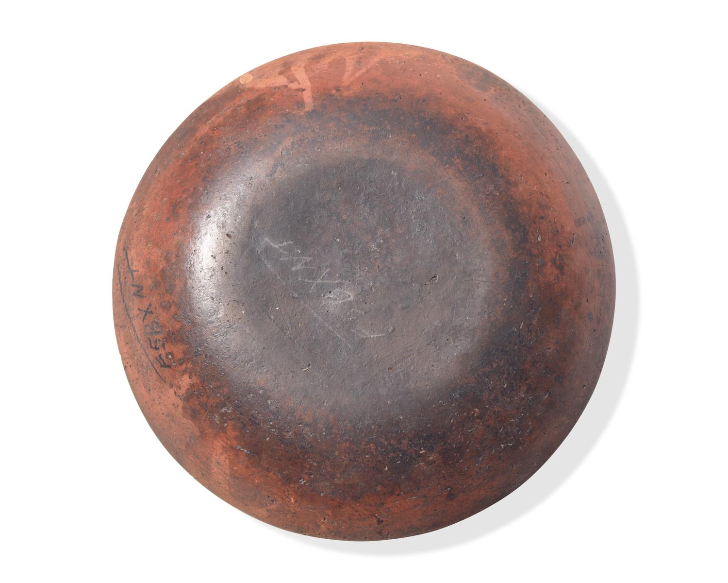 A Green and Brown Slip-Decorated Redware Pie Plate, Dryville, Pennsylvania, 19th Century