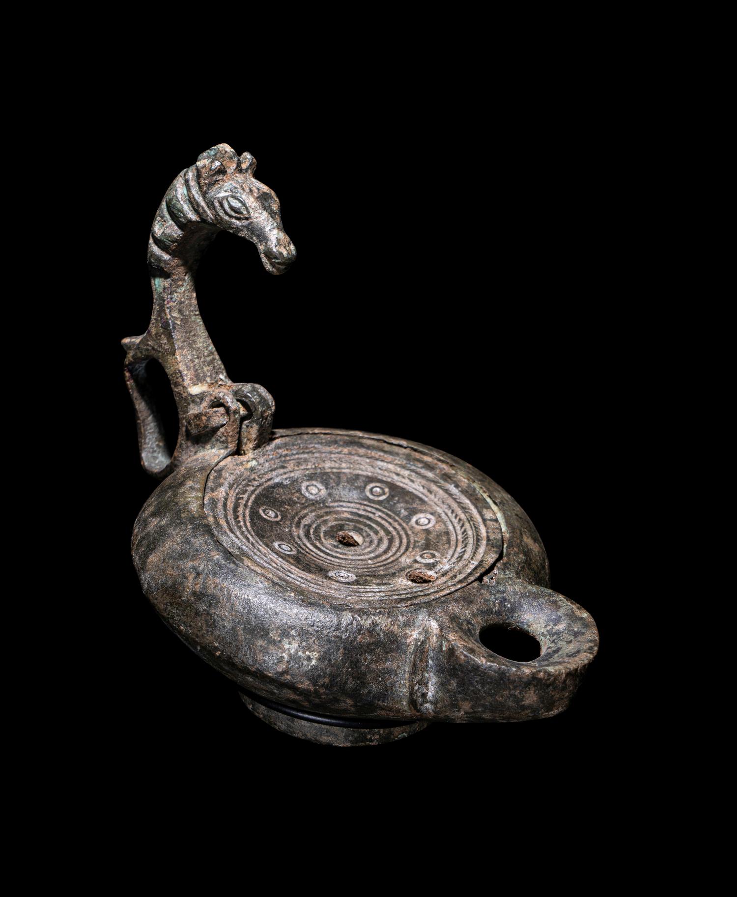 A Roman Bronze Oil Lamp