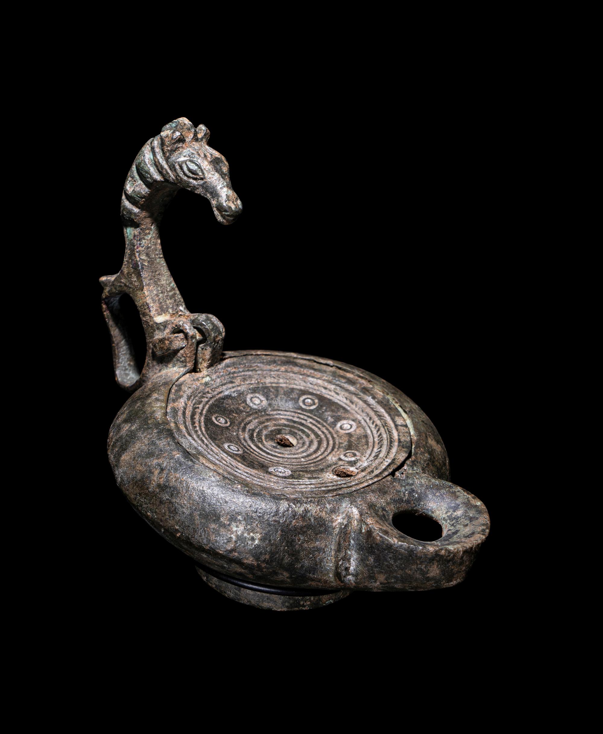A Roman Bronze Oil Lamp