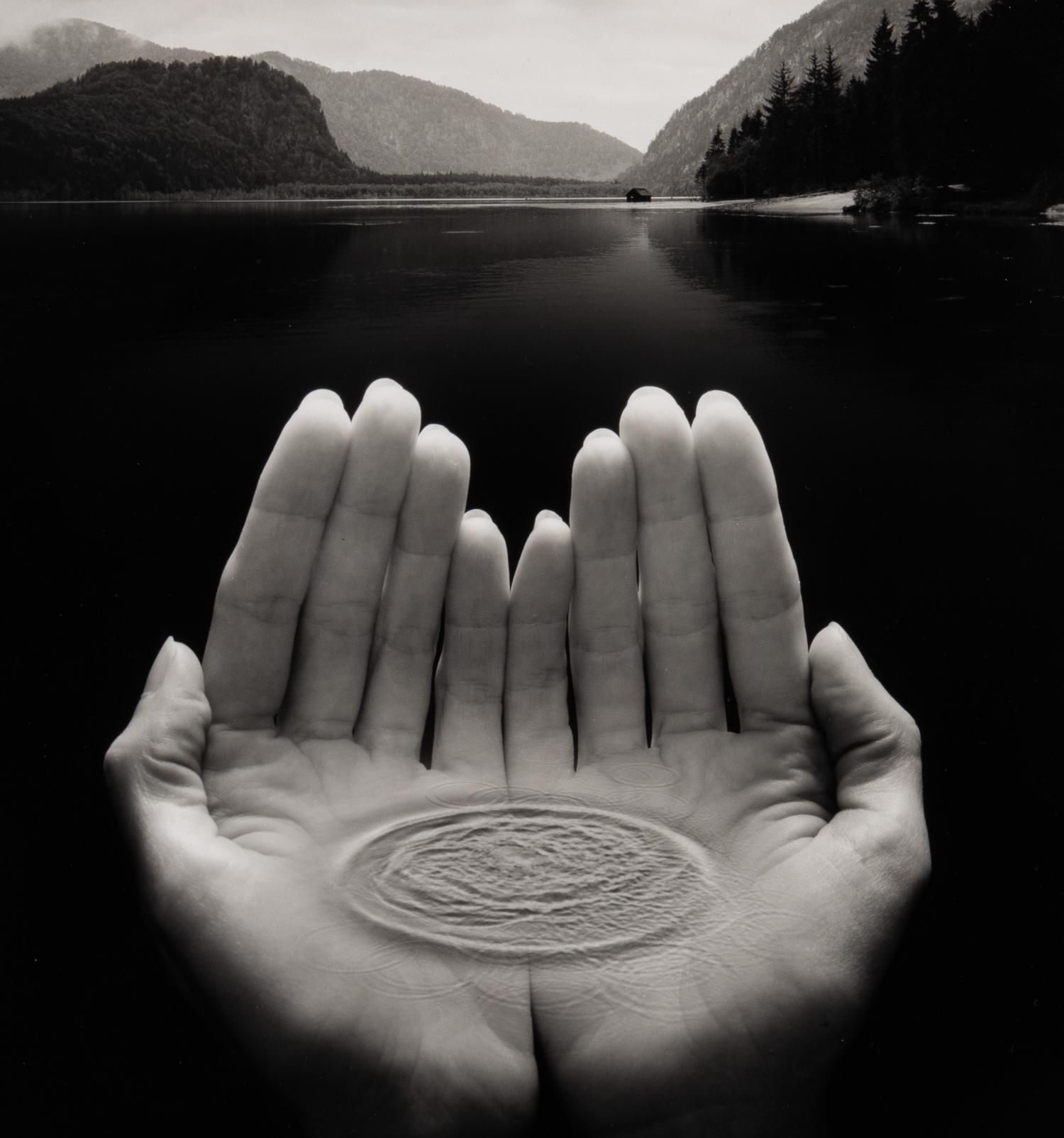 Jerry Uelsmann (1934-2022) Untitled (Hands holding water), 2002