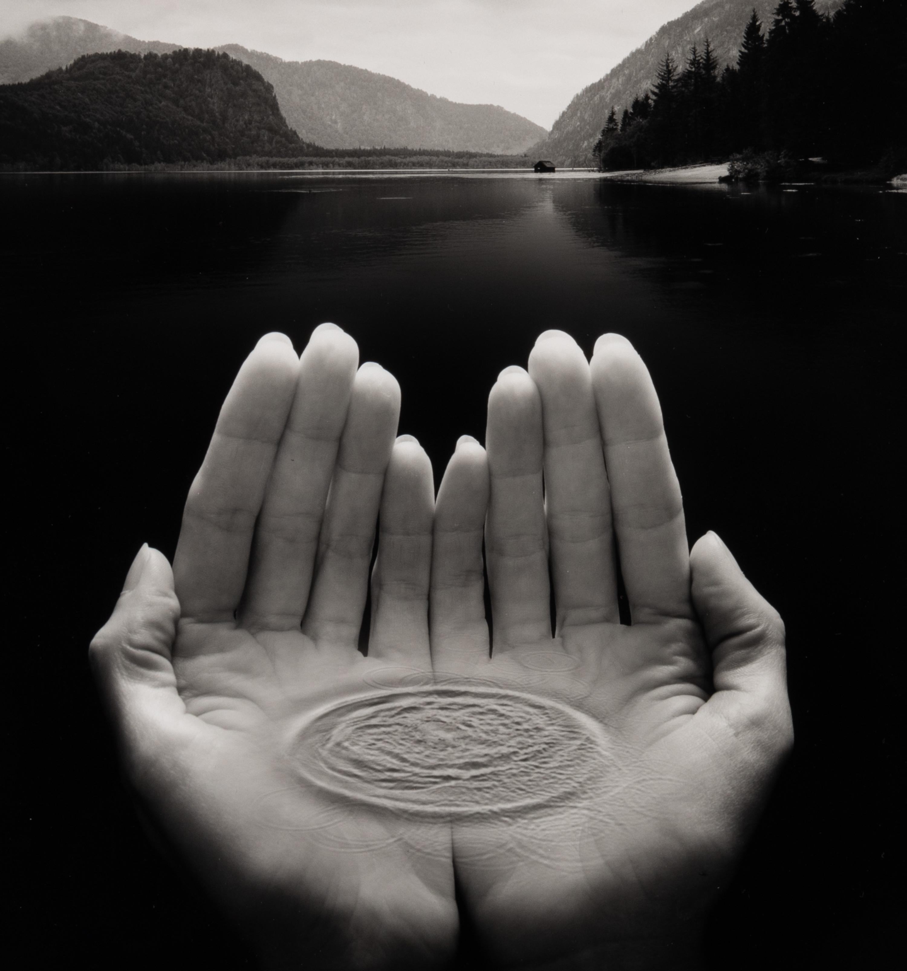 Jerry Uelsmann (1934-2022) Untitled (Hands holding water), 2002