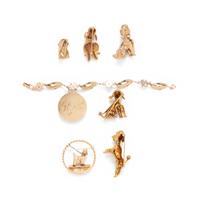 COLLECTION OF YELLOW GOLD POODLE JEWELRY