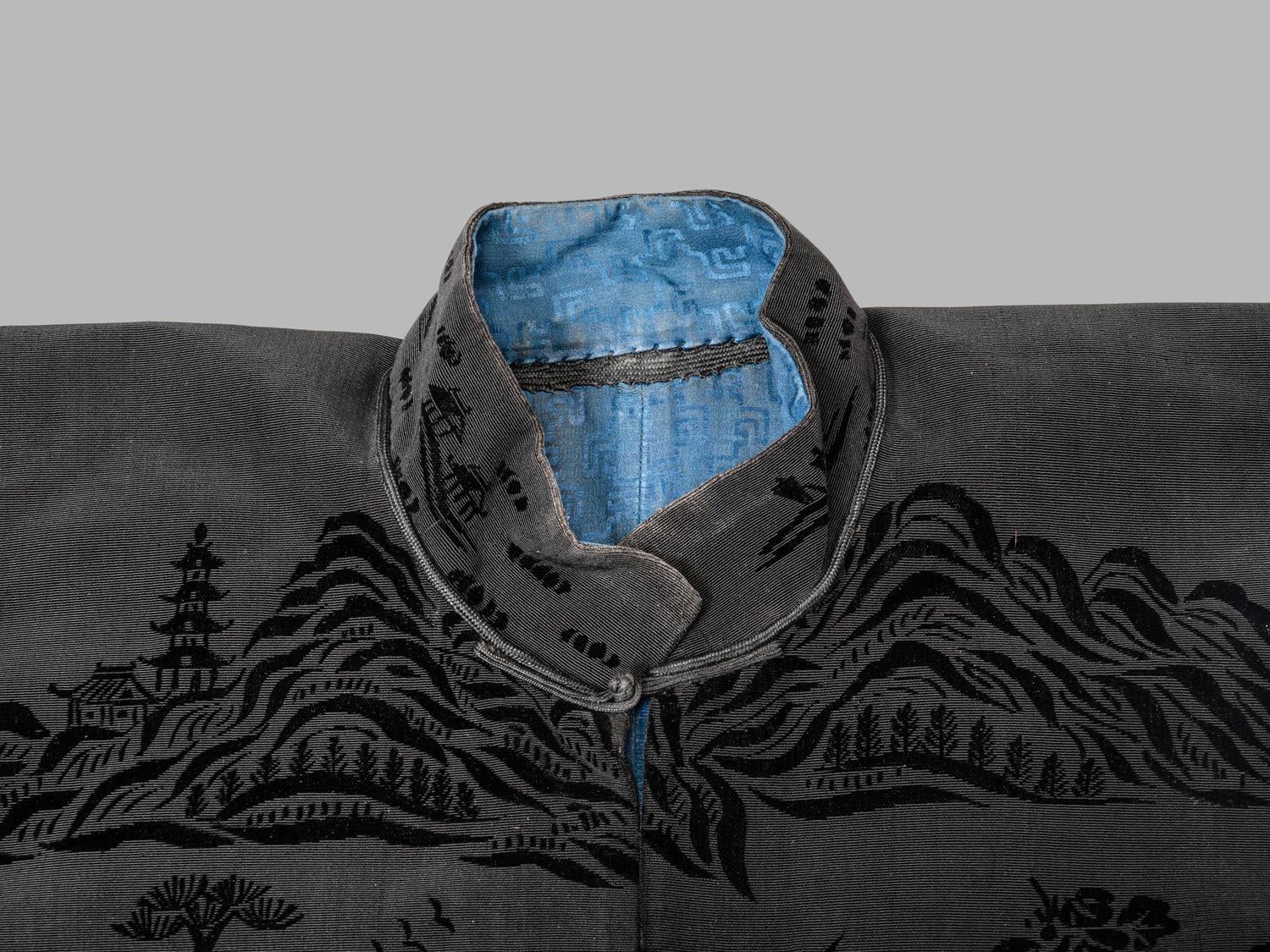 A Chinese Black Ground Silk Twill and Cut Velvet Jacket