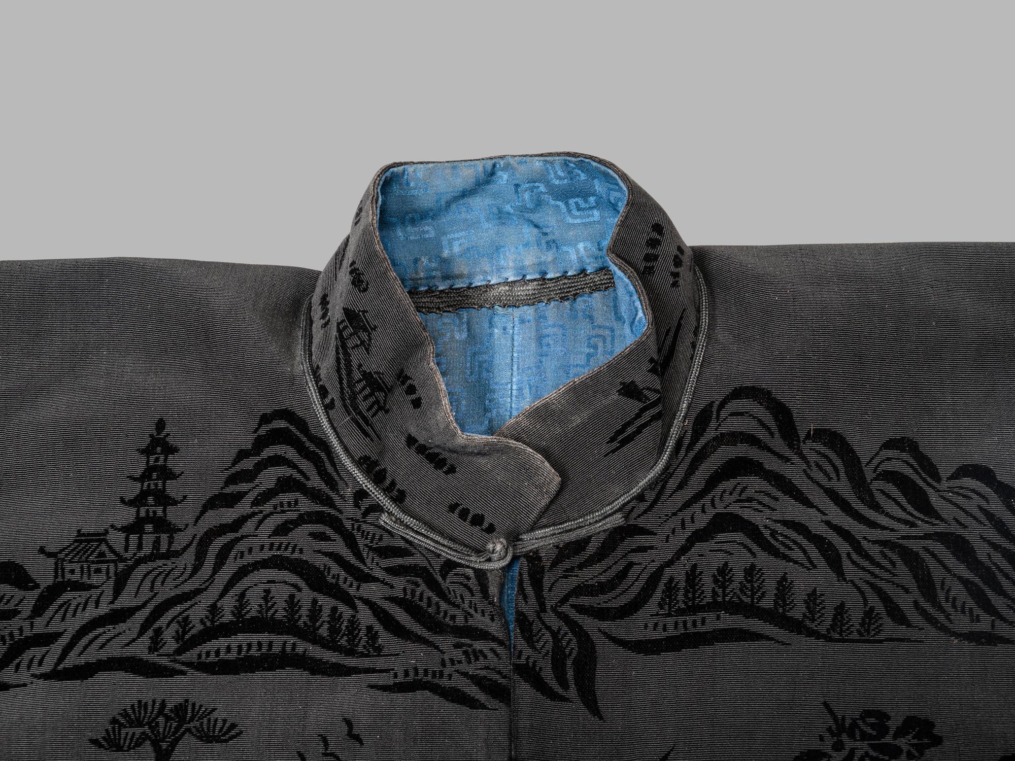 A Chinese Black Ground Silk Twill and Cut Velvet Jacket