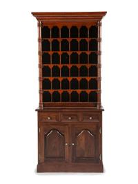 An Oak Stepback Barbershop Cabinet