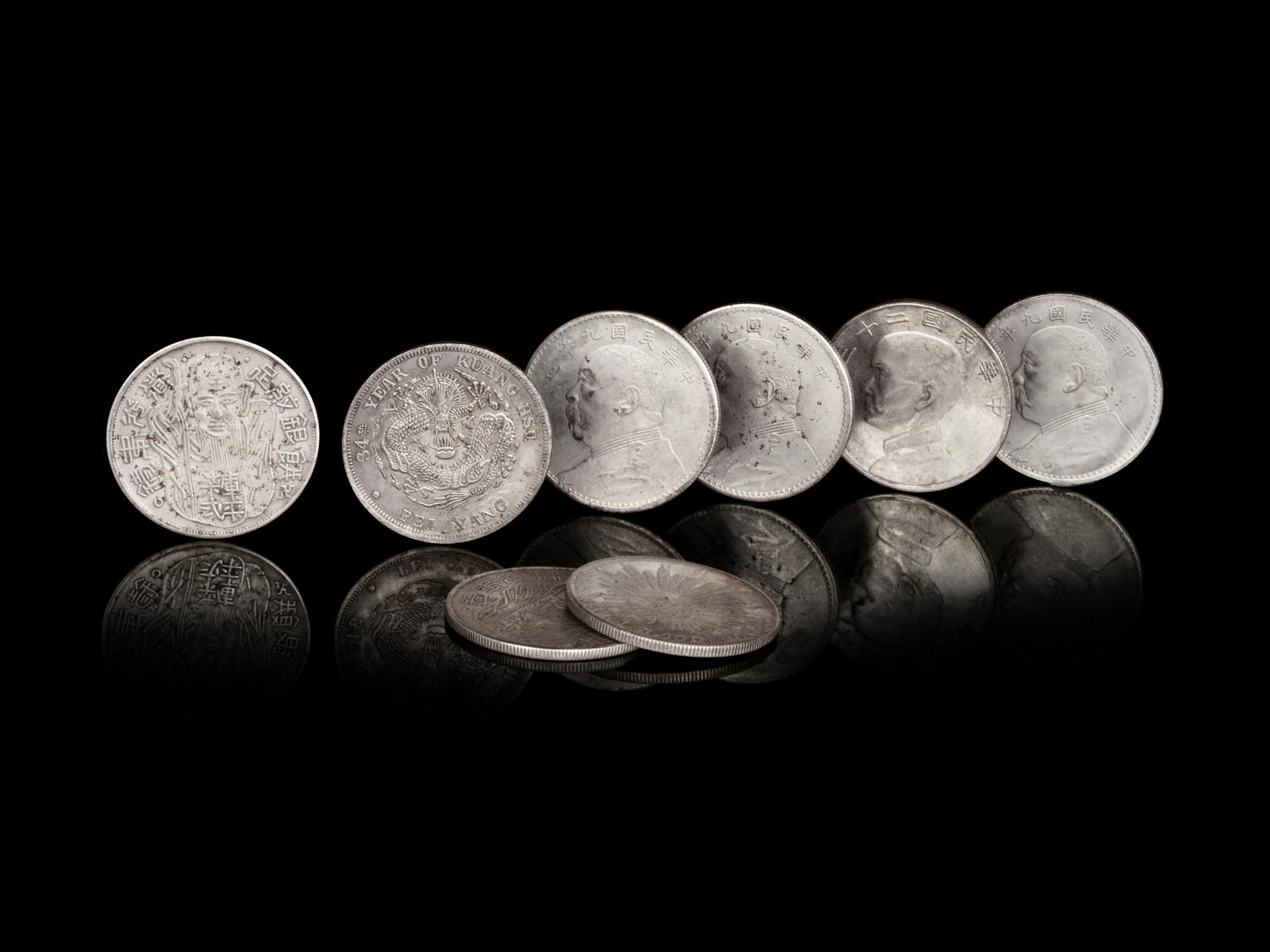 Eight Chinese Silver Coins