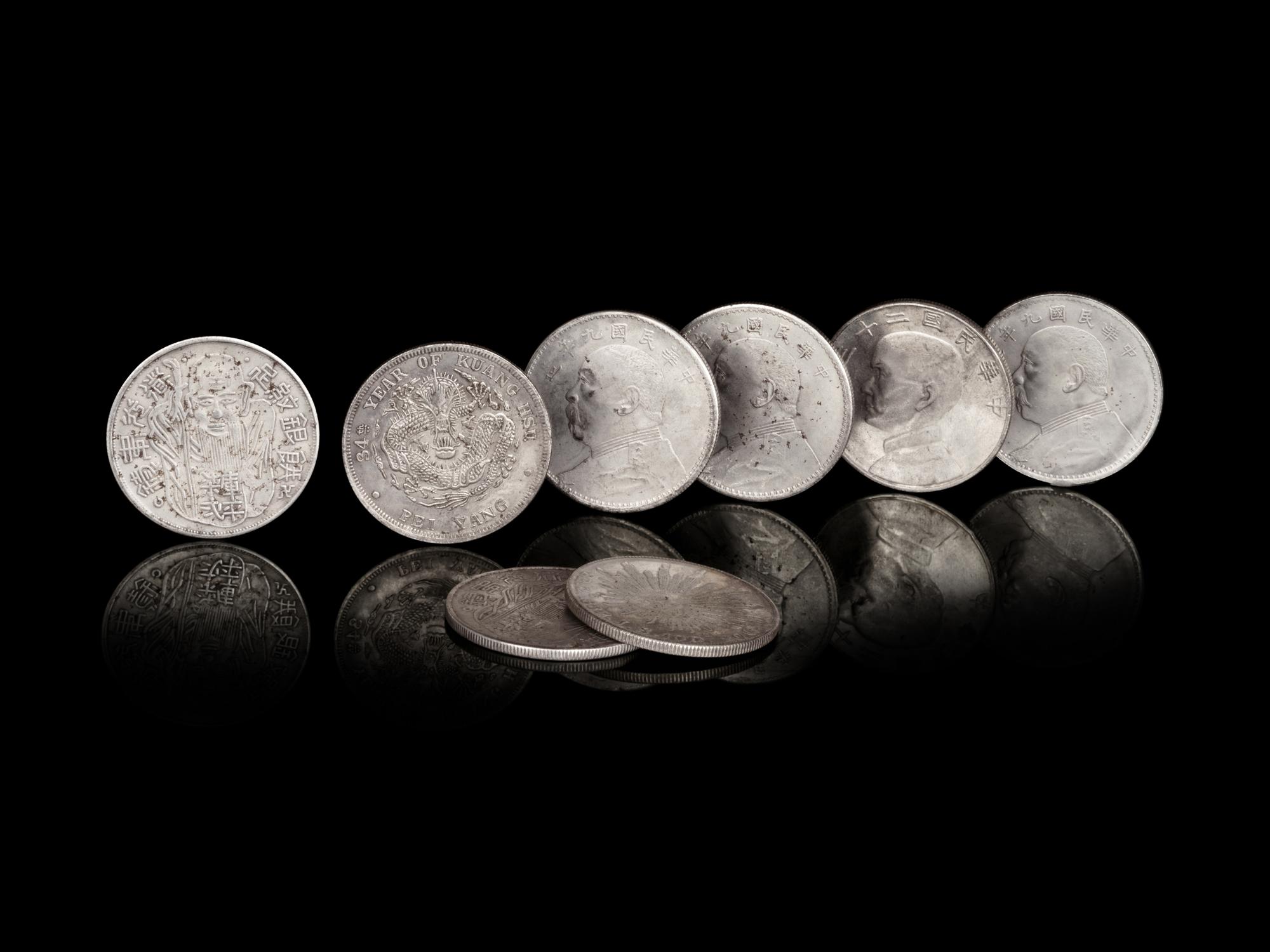 Eight Chinese Silver Coins