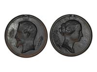 A Pair of Patinated Iron Portrait Plaques of Napoleon III and His Wife Eugenie