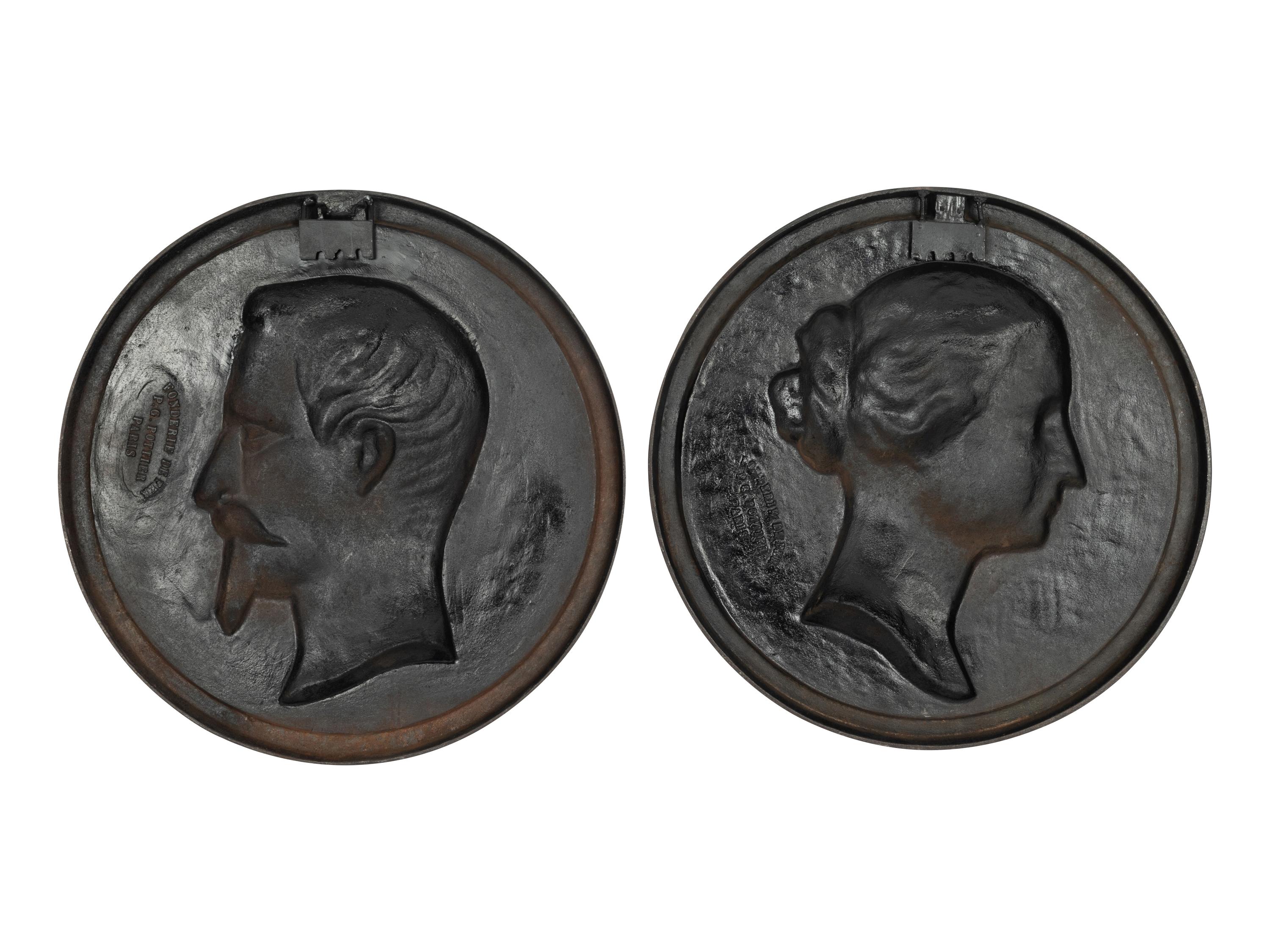 A Pair of Patinated Iron Portrait Plaques of Napoleon III and His Wife Eugenie