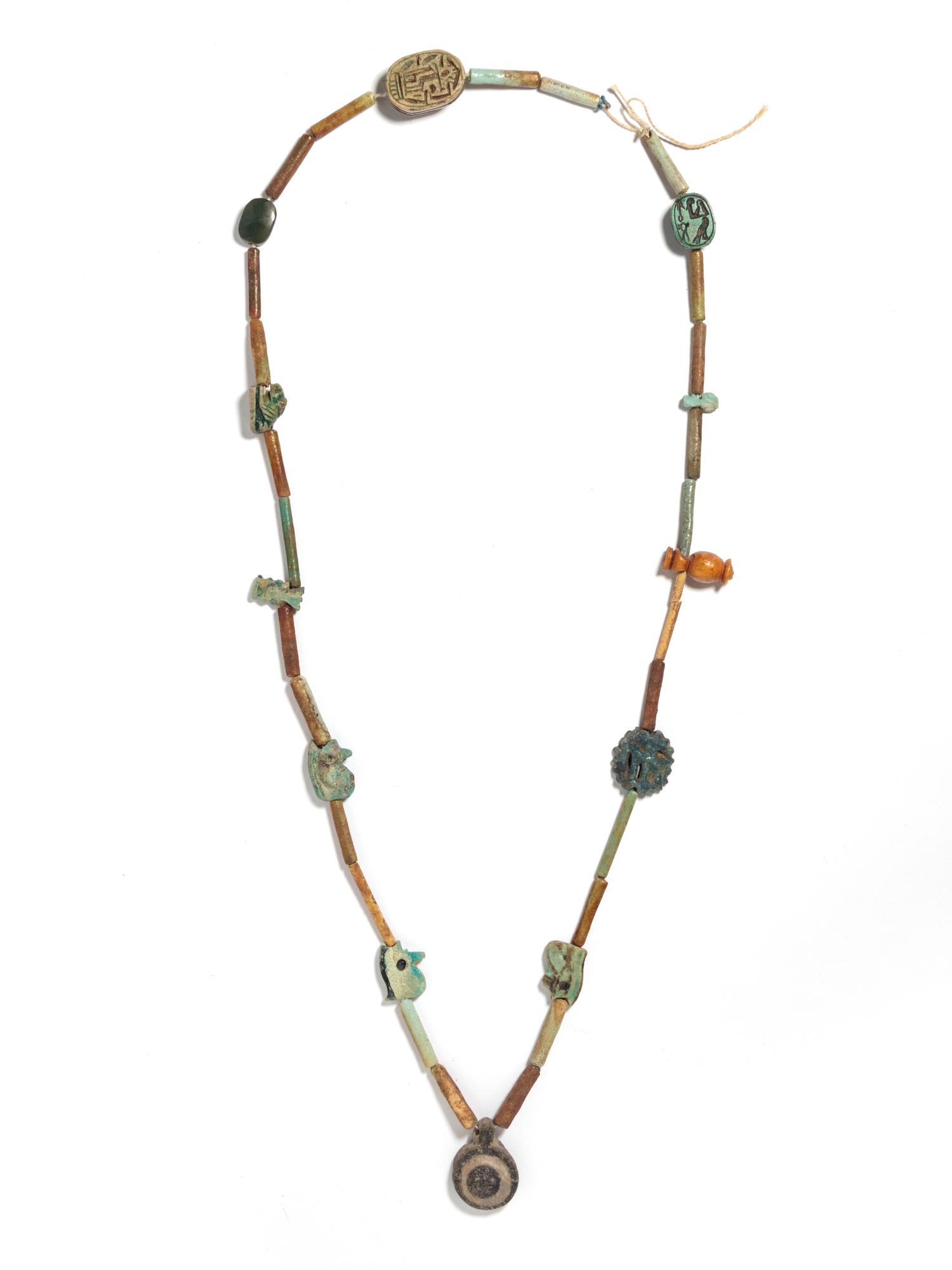 An Egyptian Faience Bead and Amulet Necklace