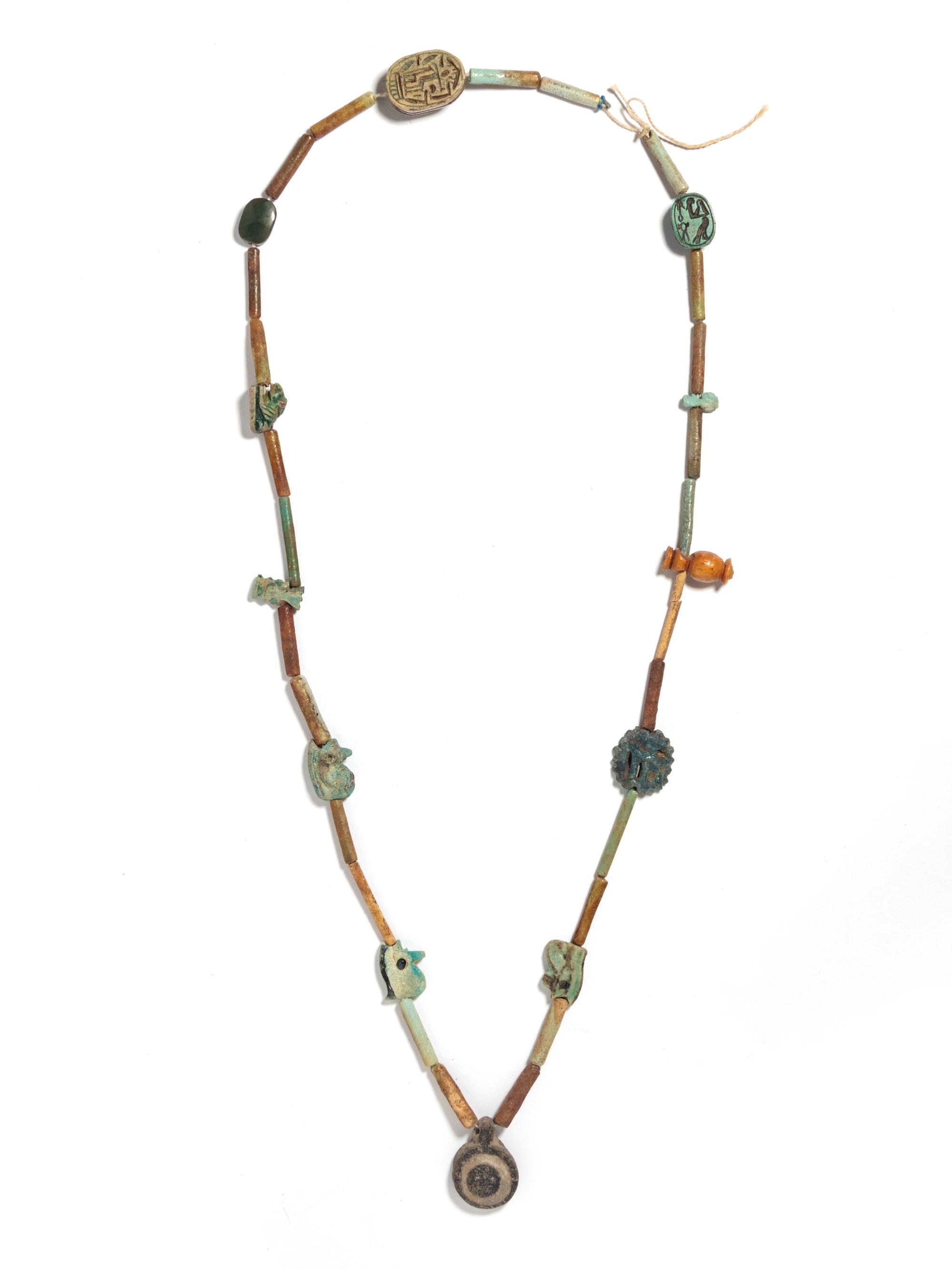 An Egyptian Faience Bead and Amulet Necklace